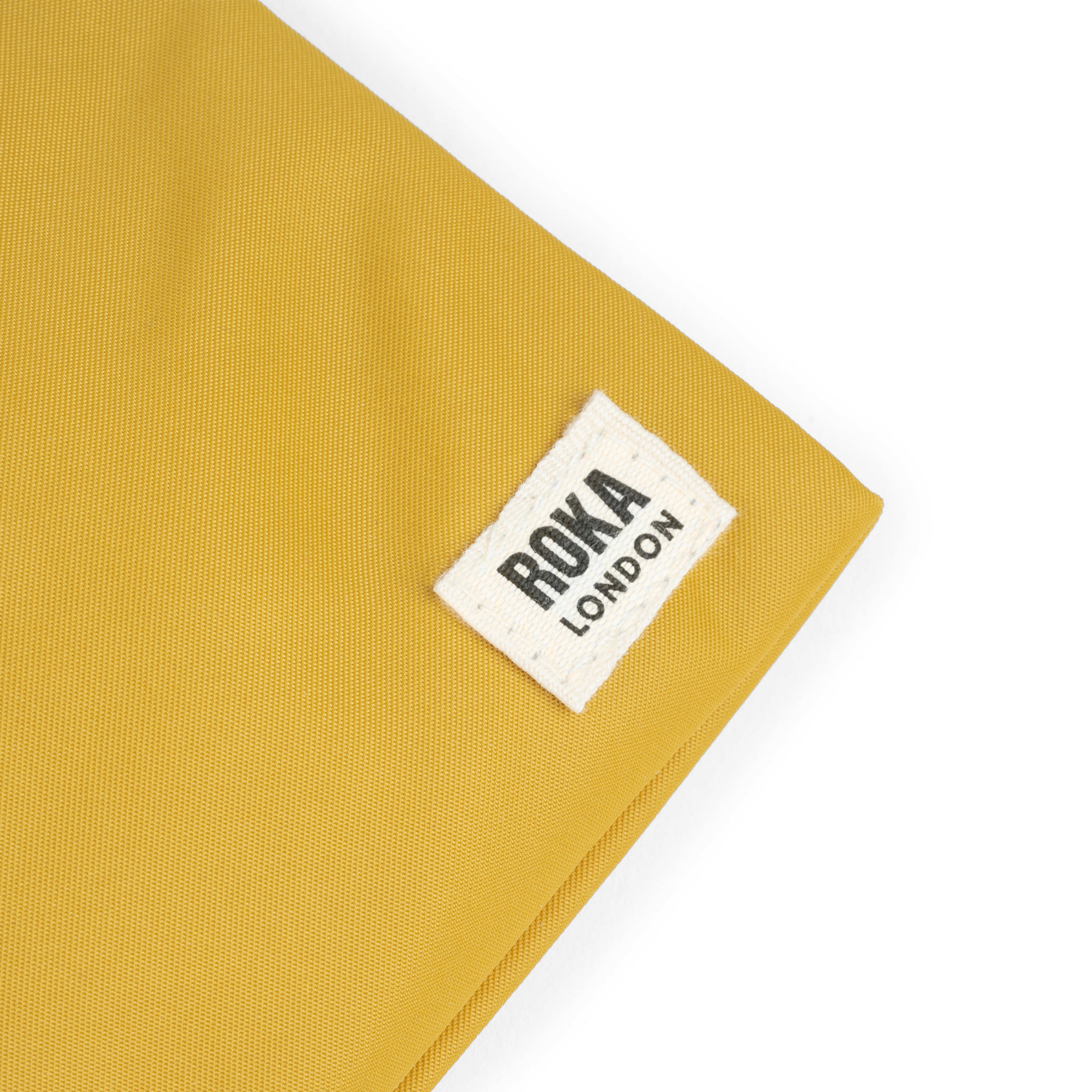 Roka London Chelsea Pocket slingveske corn XS værbestandig
