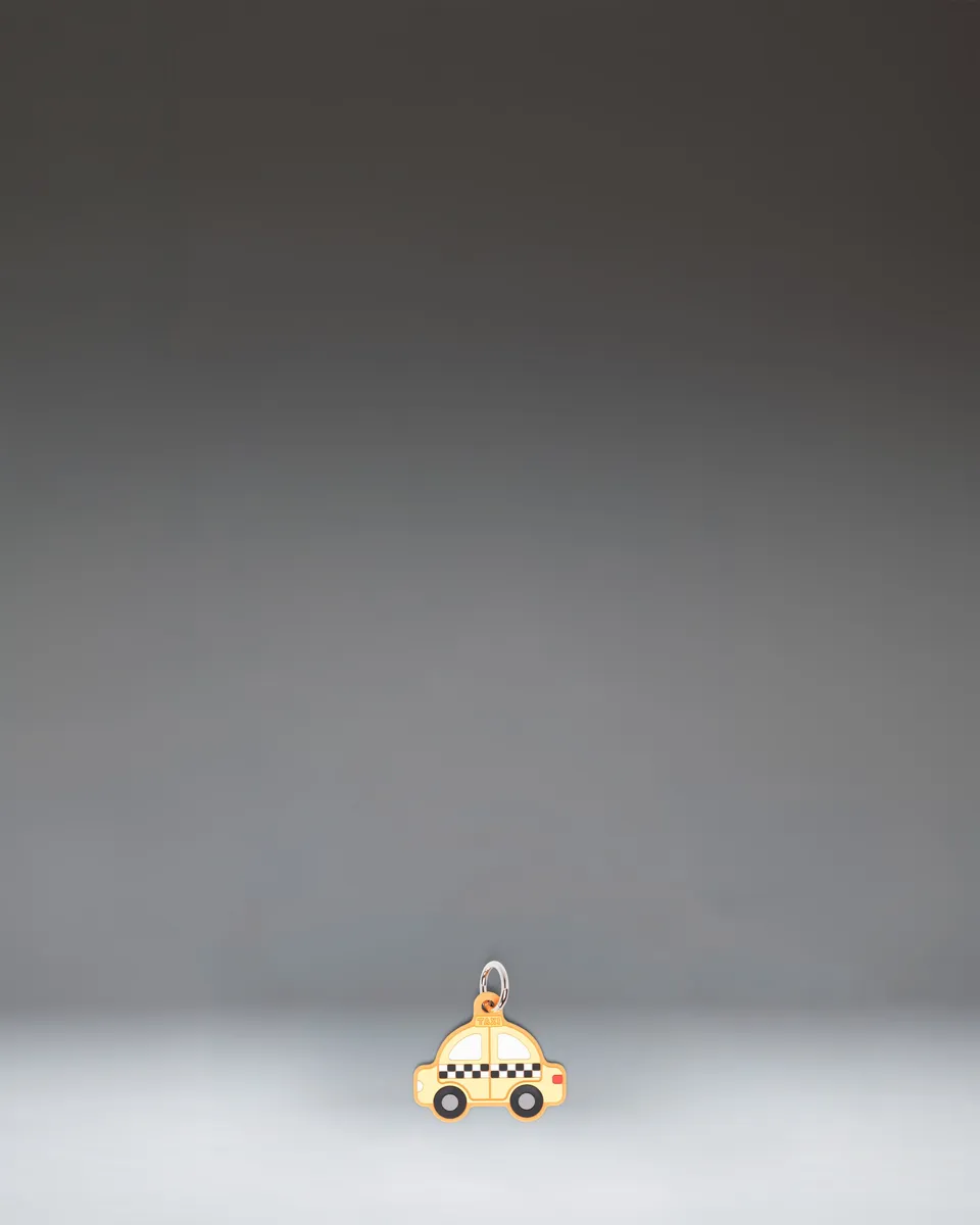 Herschel Taxi bag charm gult taxi-anheng silikon