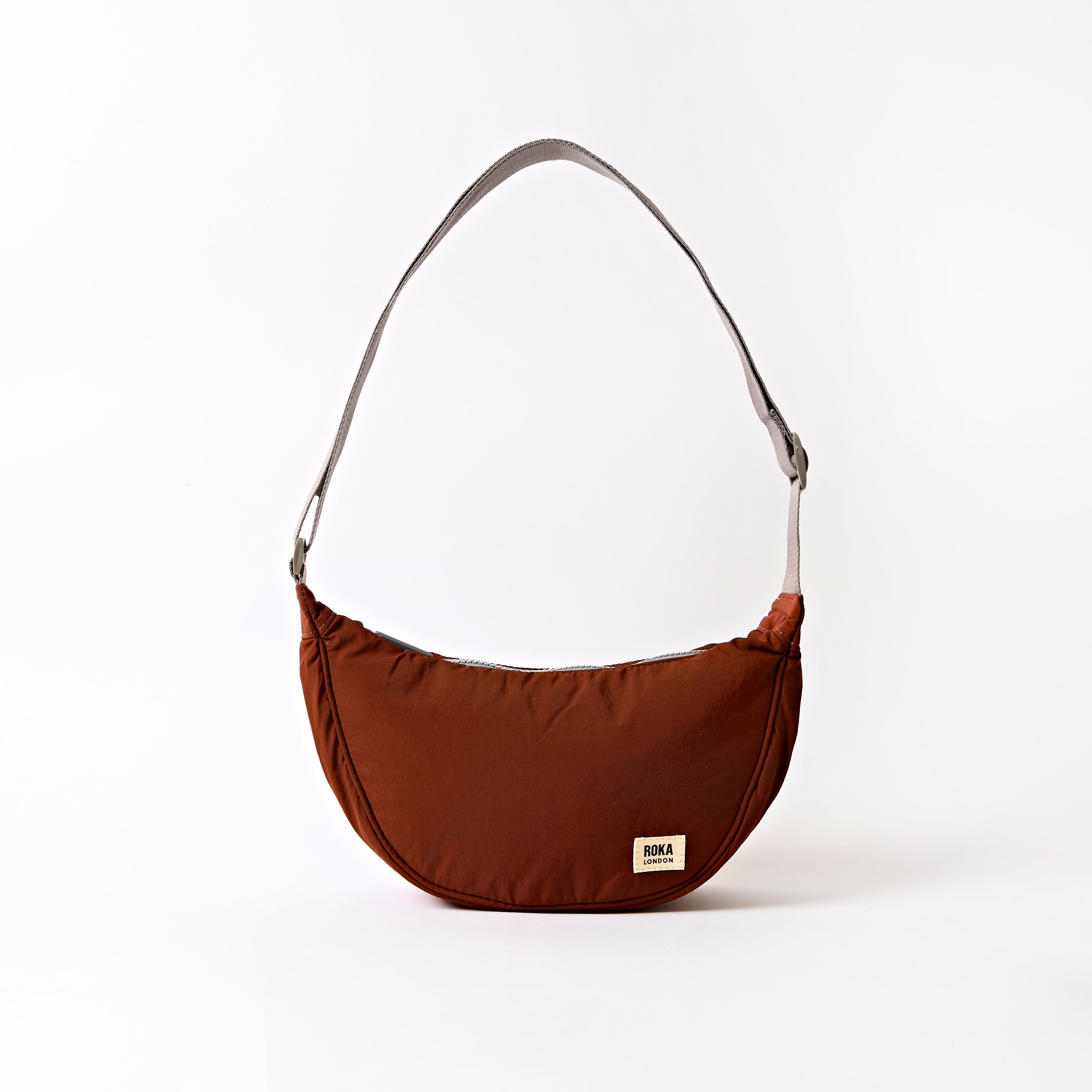 Roka London Farringdon Half Moon skulderveske henna small myk