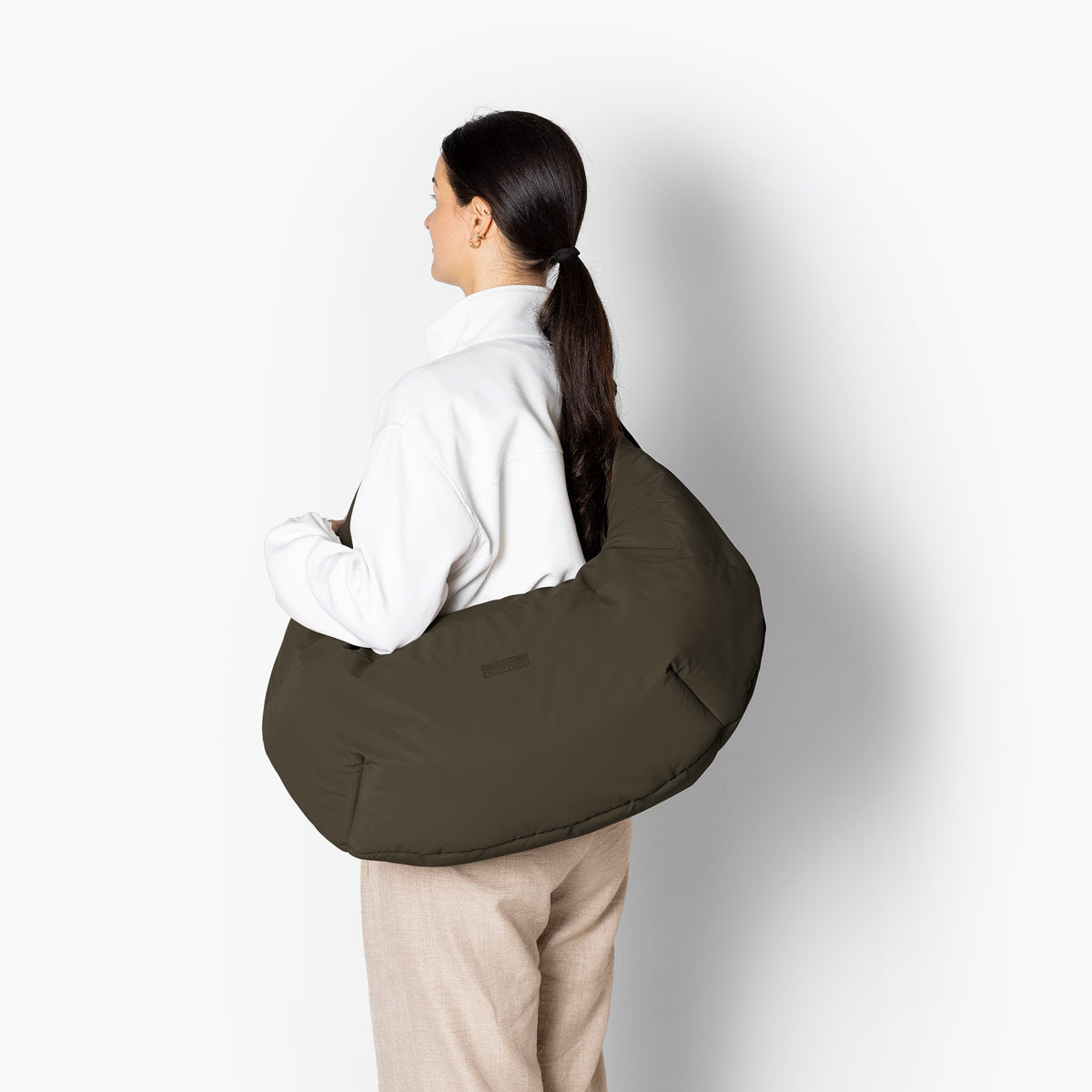 Ucon Acrobatics Shota Puffy veske furugrønn medium polstret