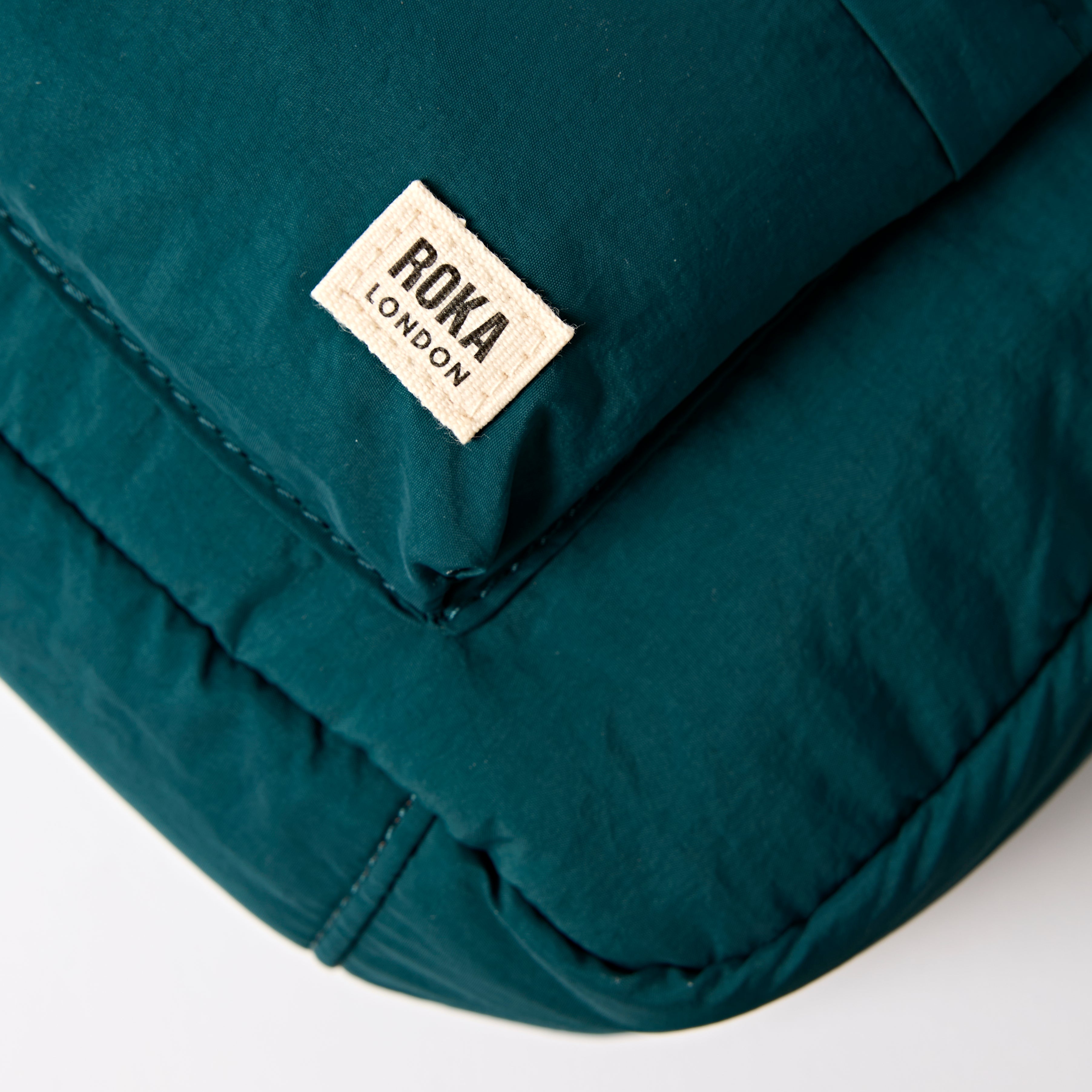 Roka London Belsize håndveske teal small 7 liter