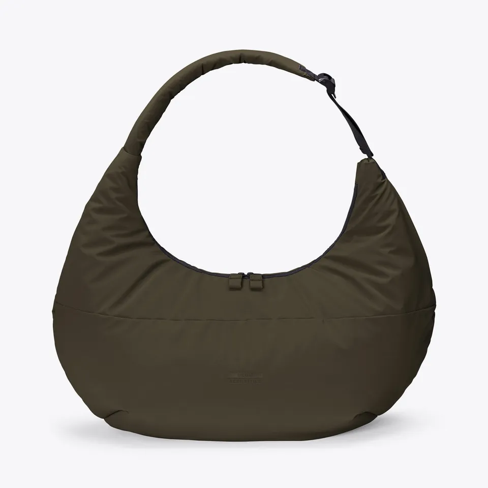 Ucon Acrobatics Shota Puffy veske furugrønn medium polstret