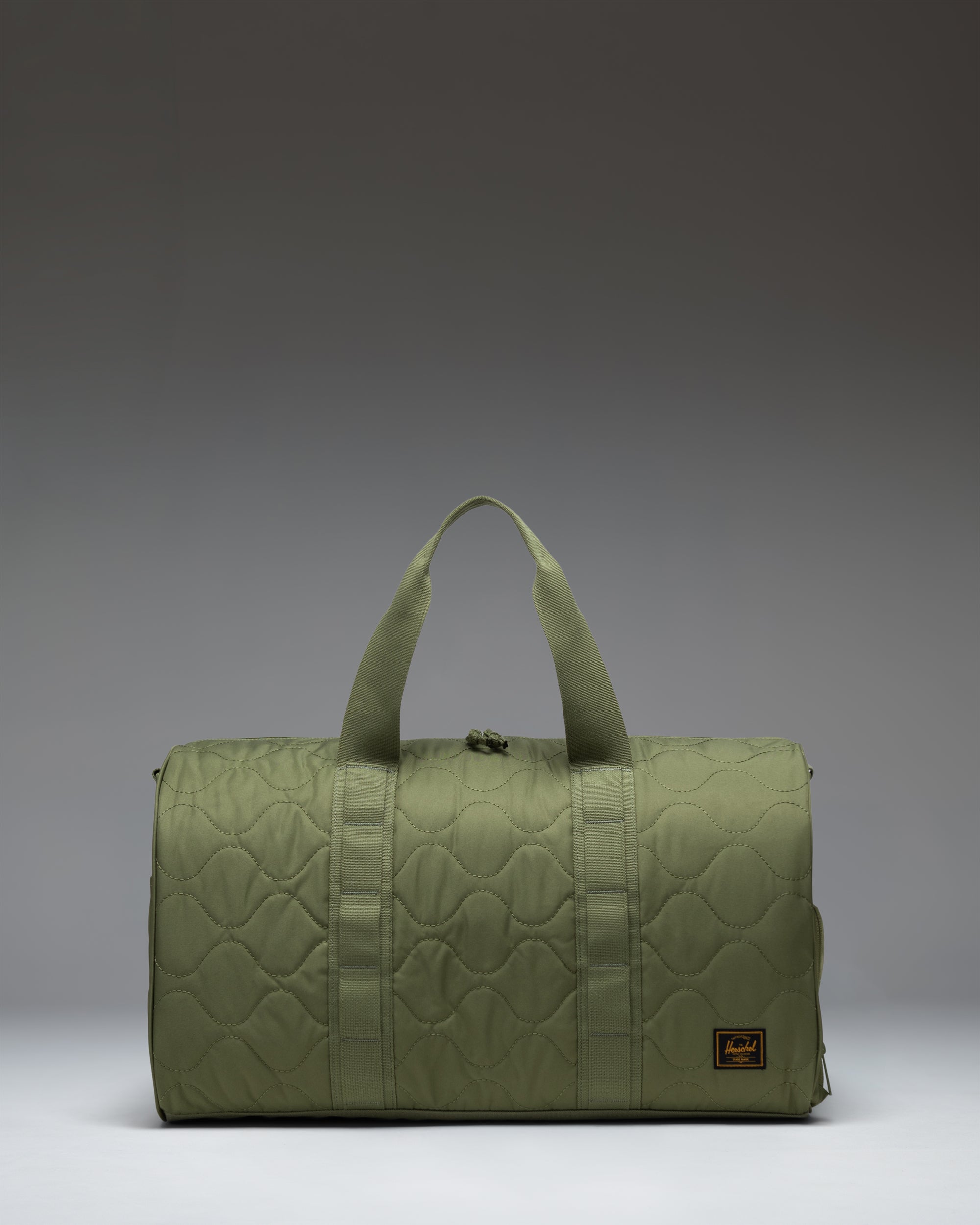 Herschel Novel Quilted Capsule duffel svart vattert