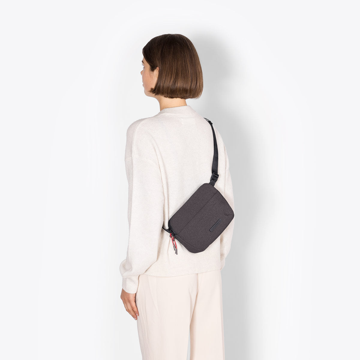 Ucon Acrobatics Melvin crossbody-veske Medium Asphalt Reflective synlig