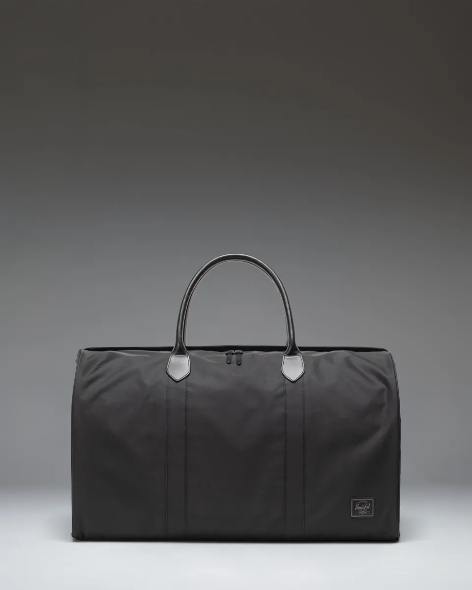 Herschel Novel Duffle duffelbag svart premium skinn