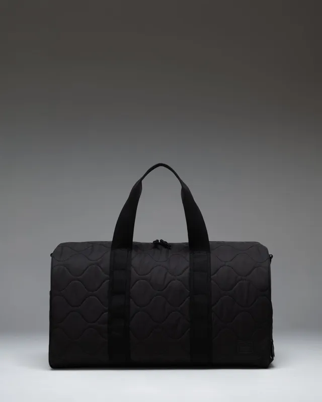 Herschel Novel Quilted Capsule duffel svart vattert