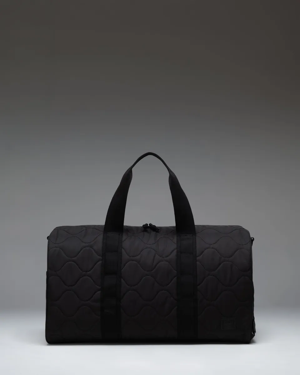 Herschel Novel Quilted Capsule duffel svart vattert
