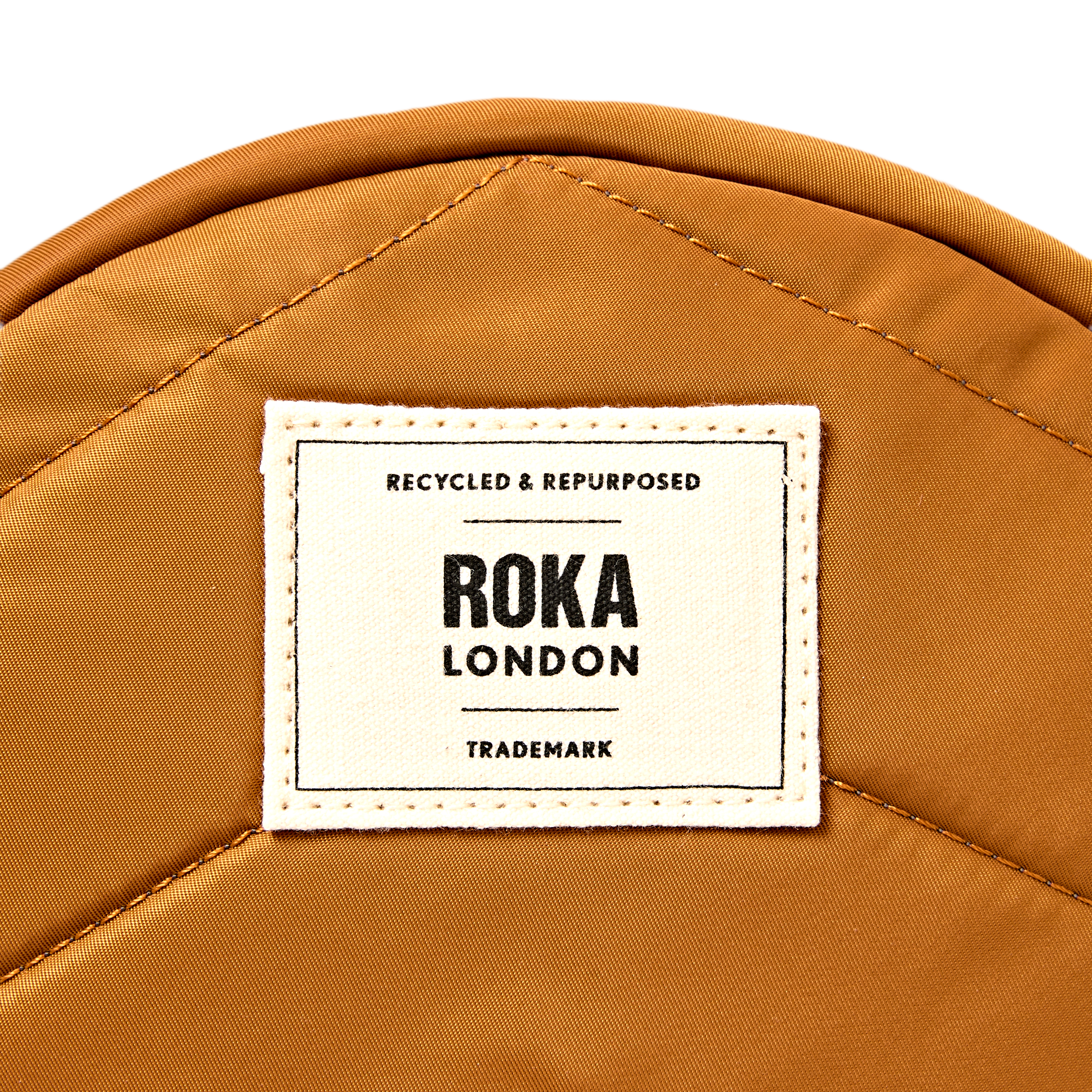 Roka London Paddington rund veske Small Biscuit crossbody 4,1L
