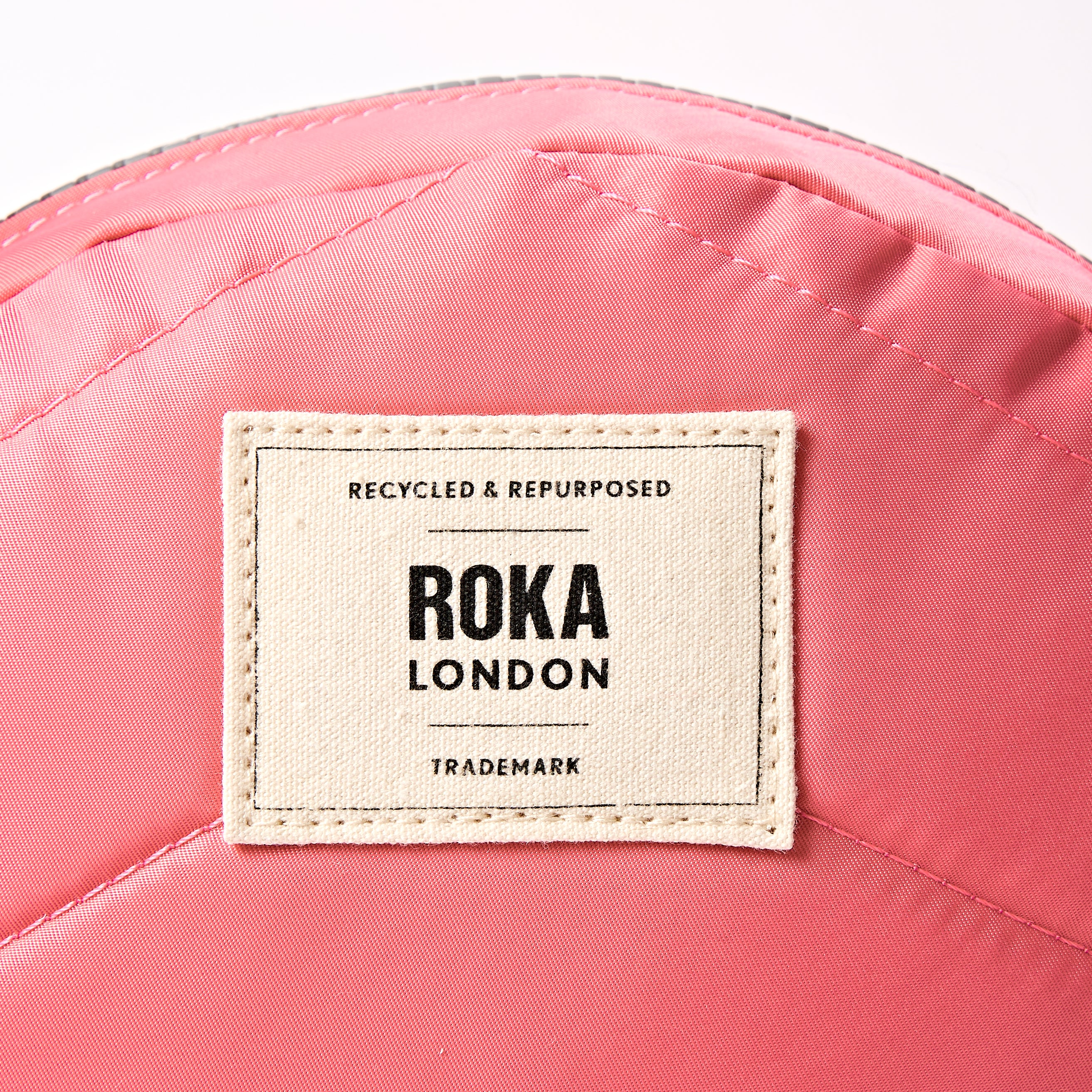 Roka London Paddington Small rund veske pink lemonade
