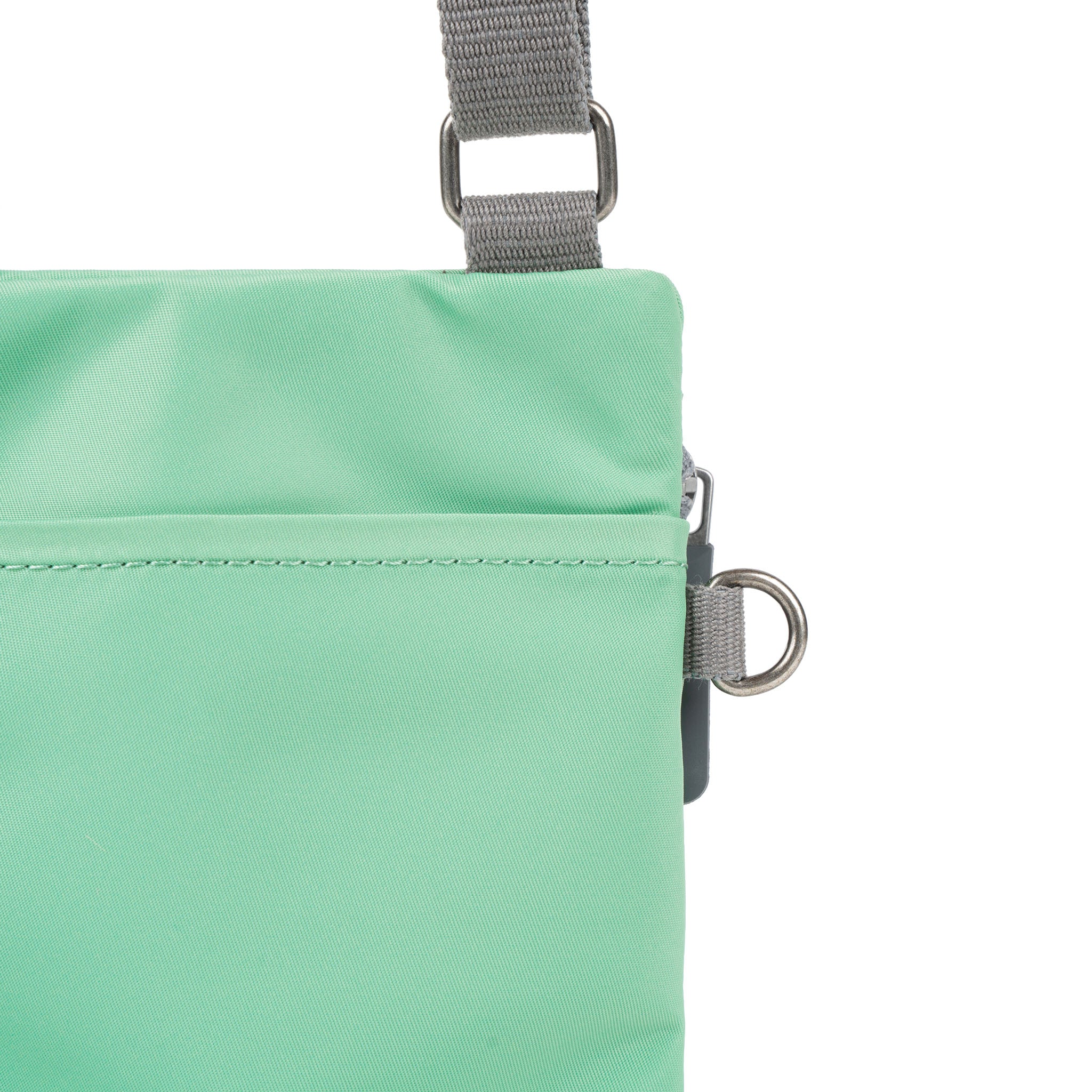 Roka London Chelsea Pocket Sling skulderveske matcha XS værbestandig