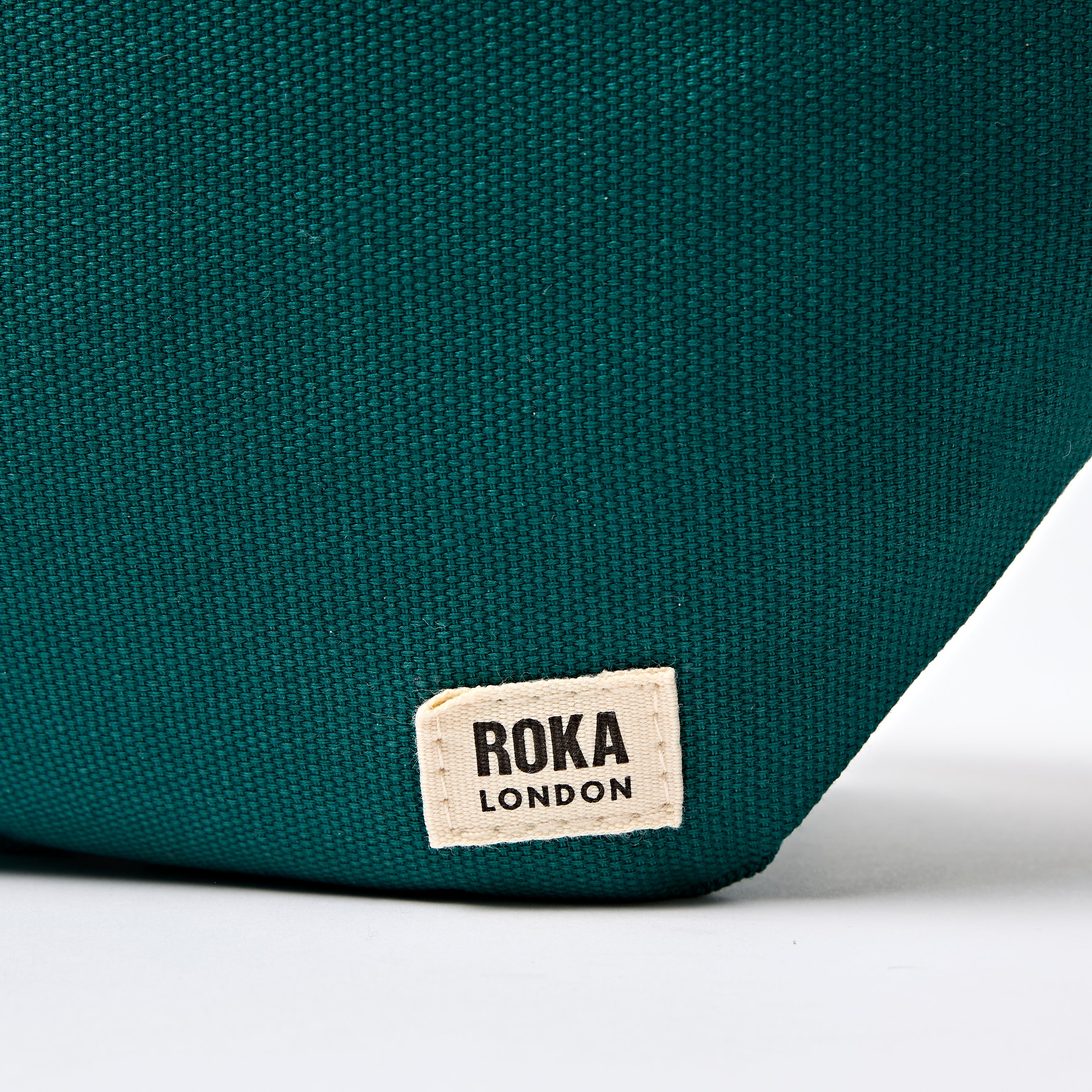 Roka London Mill Hill Small midjeveske teal bomullscanvas