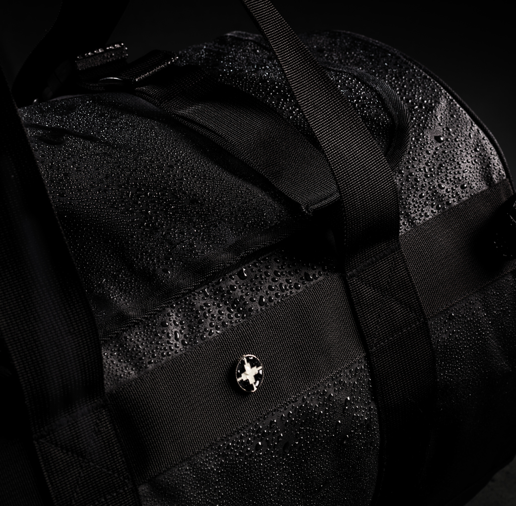 Swiss Peak RFID sportsduffel og ryggsekk svart 2-i-1