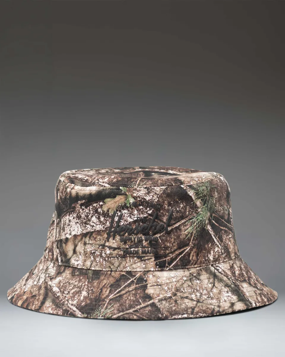 Herschel Norman bøttehatt Realtree APX camo SM