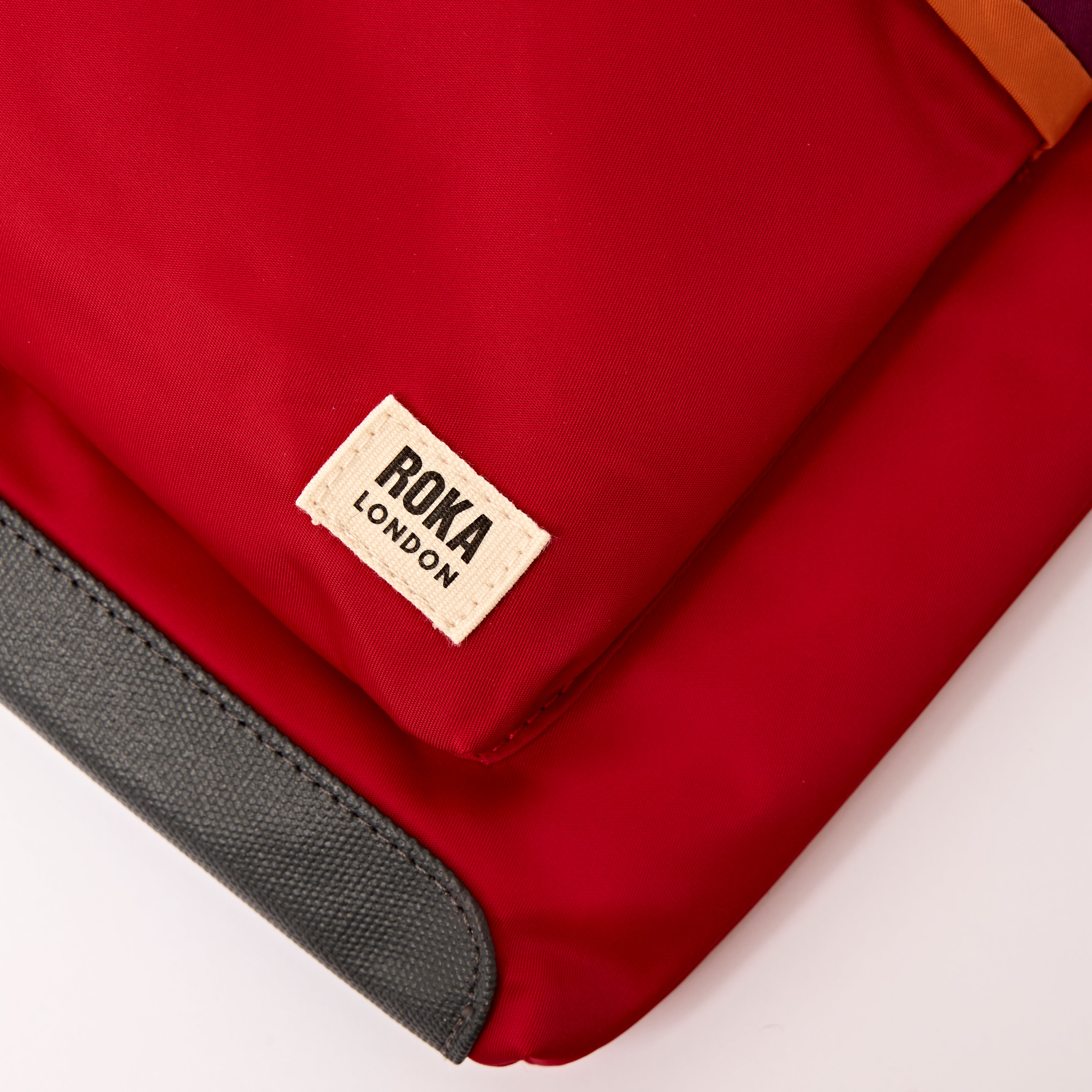 Roka London Kennington crossbody medium cranberry stripe slank