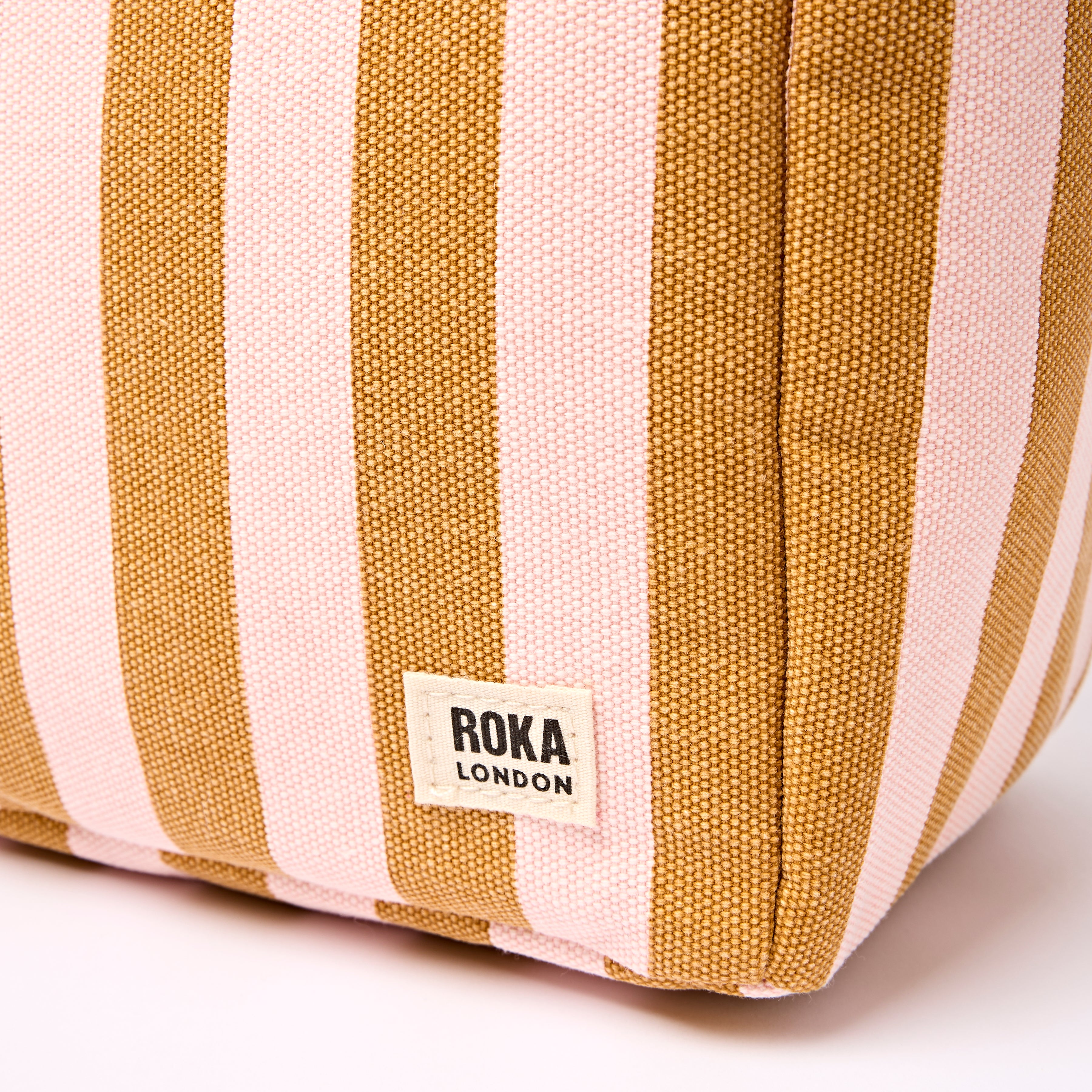 Roka London Hampstead Lunch lunsjveske rose gold stripe 7,3 liter
