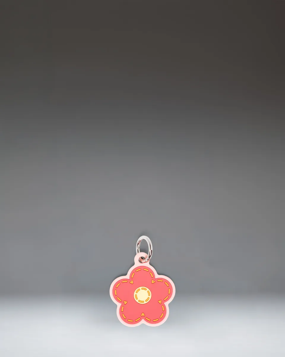 Herschel Daisy veskecharm Pink Daisy silikon