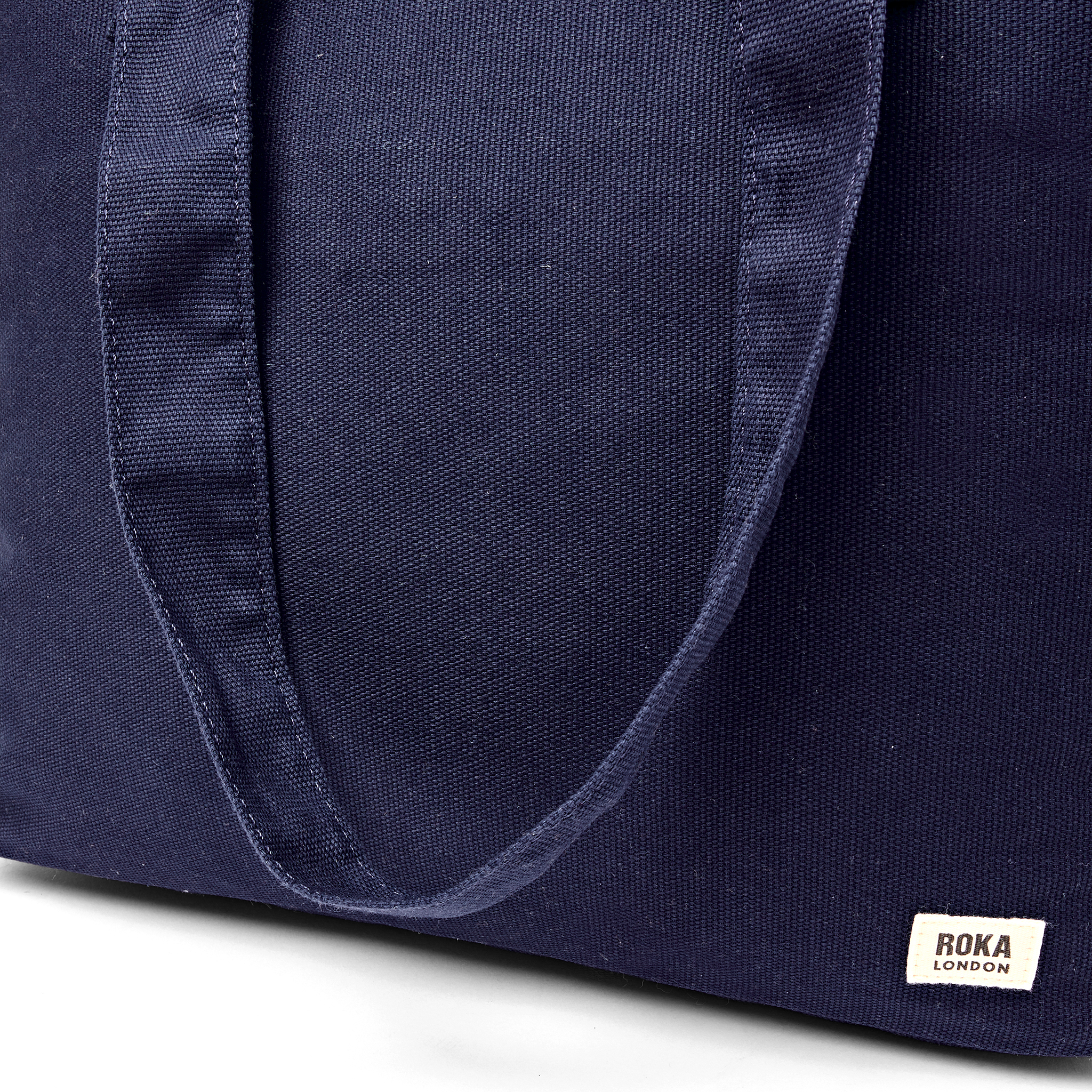 Roka London Sloane tote Medium navy blå canvas 24 liter
