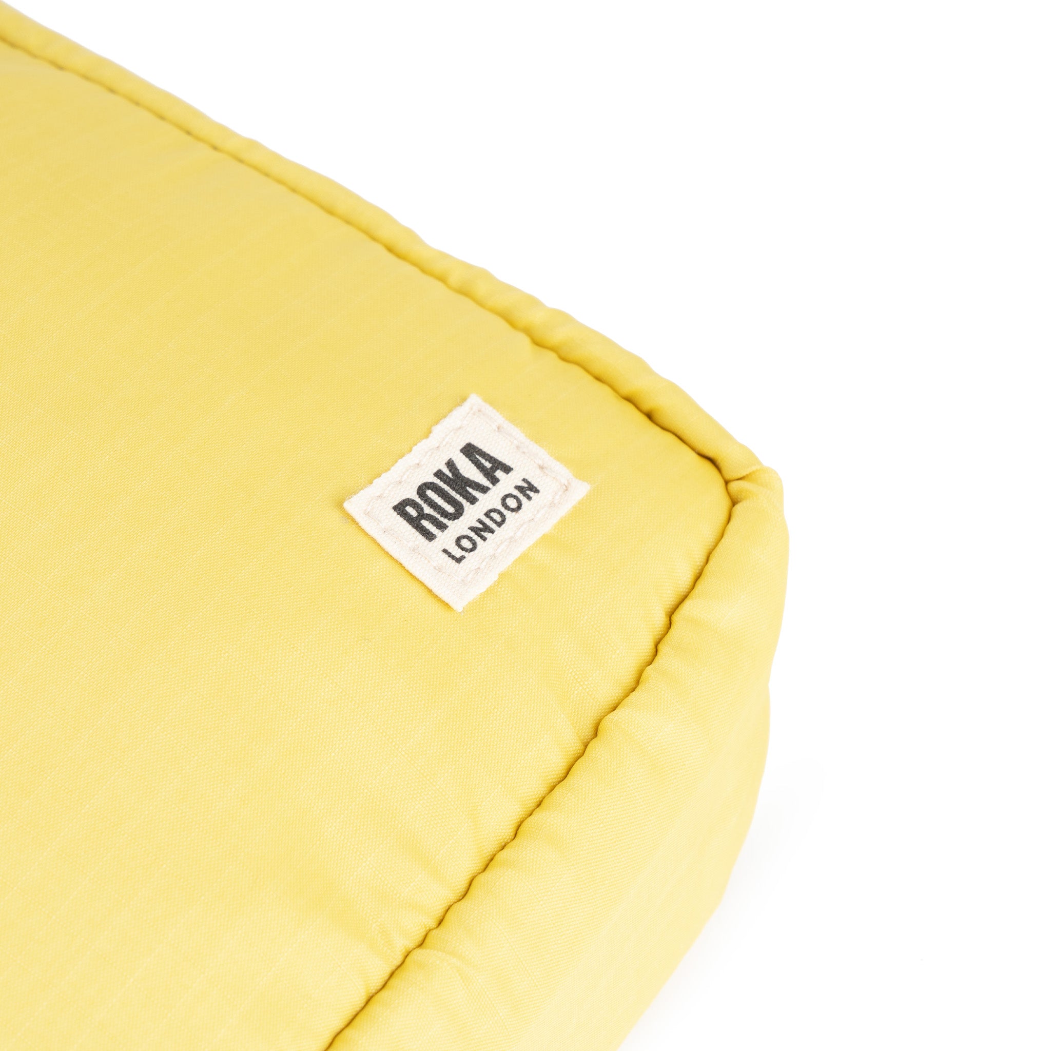 Roka London Bond Pocket crossbody citron small 1,5 liter