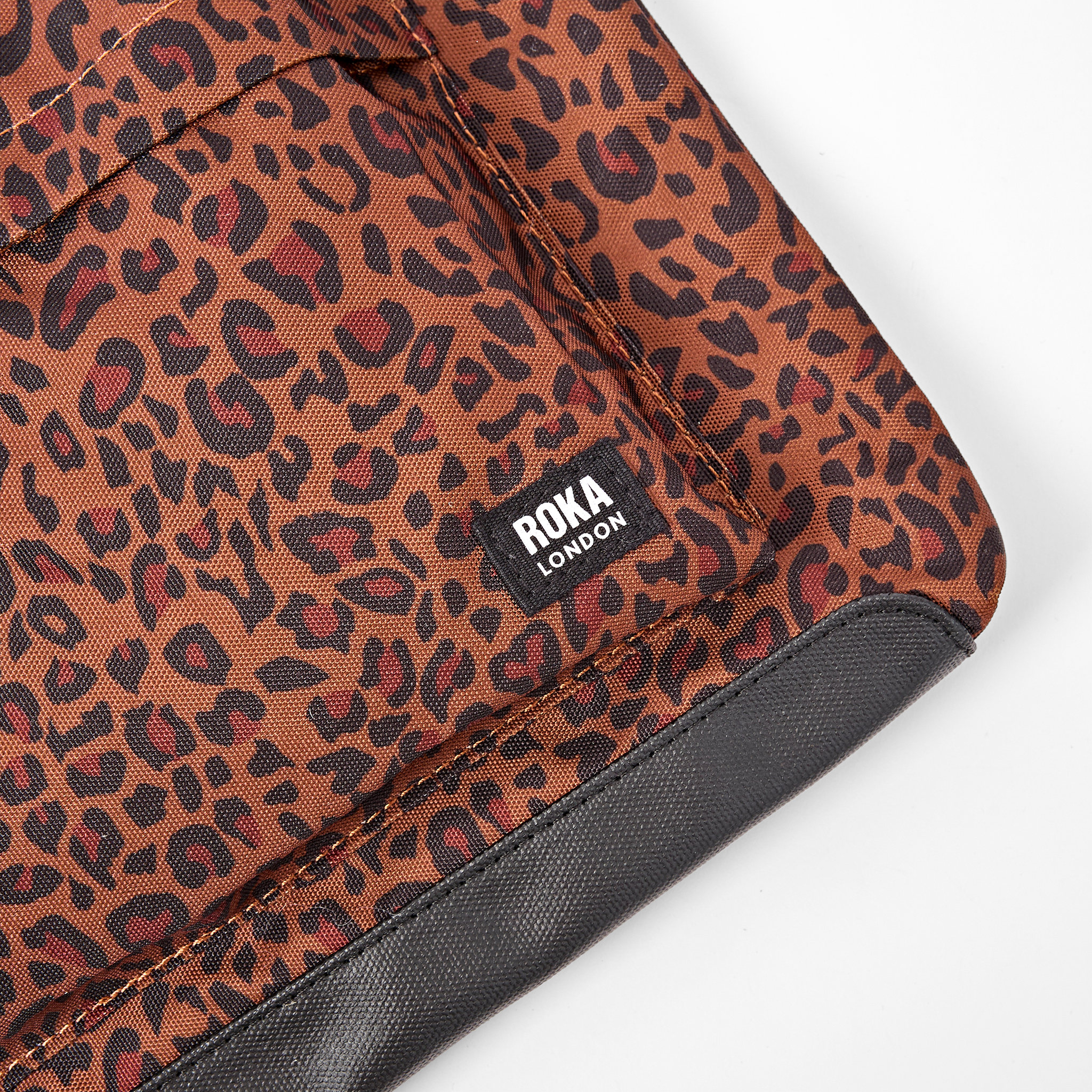 Roka London Kennington crossbody corn mini leopard medium