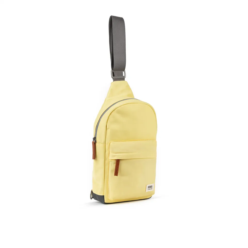 Roka London Willesden Large slingveske citron 5 liter
