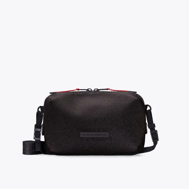 Ucon Acrobatics Ando crossbody-veske Medium Asphalt Reflective lett