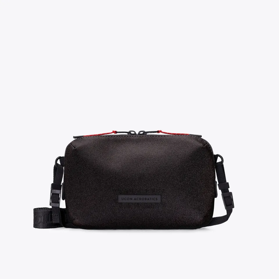Ucon Acrobatics Ando crossbody-veske Medium Asphalt Reflective lett