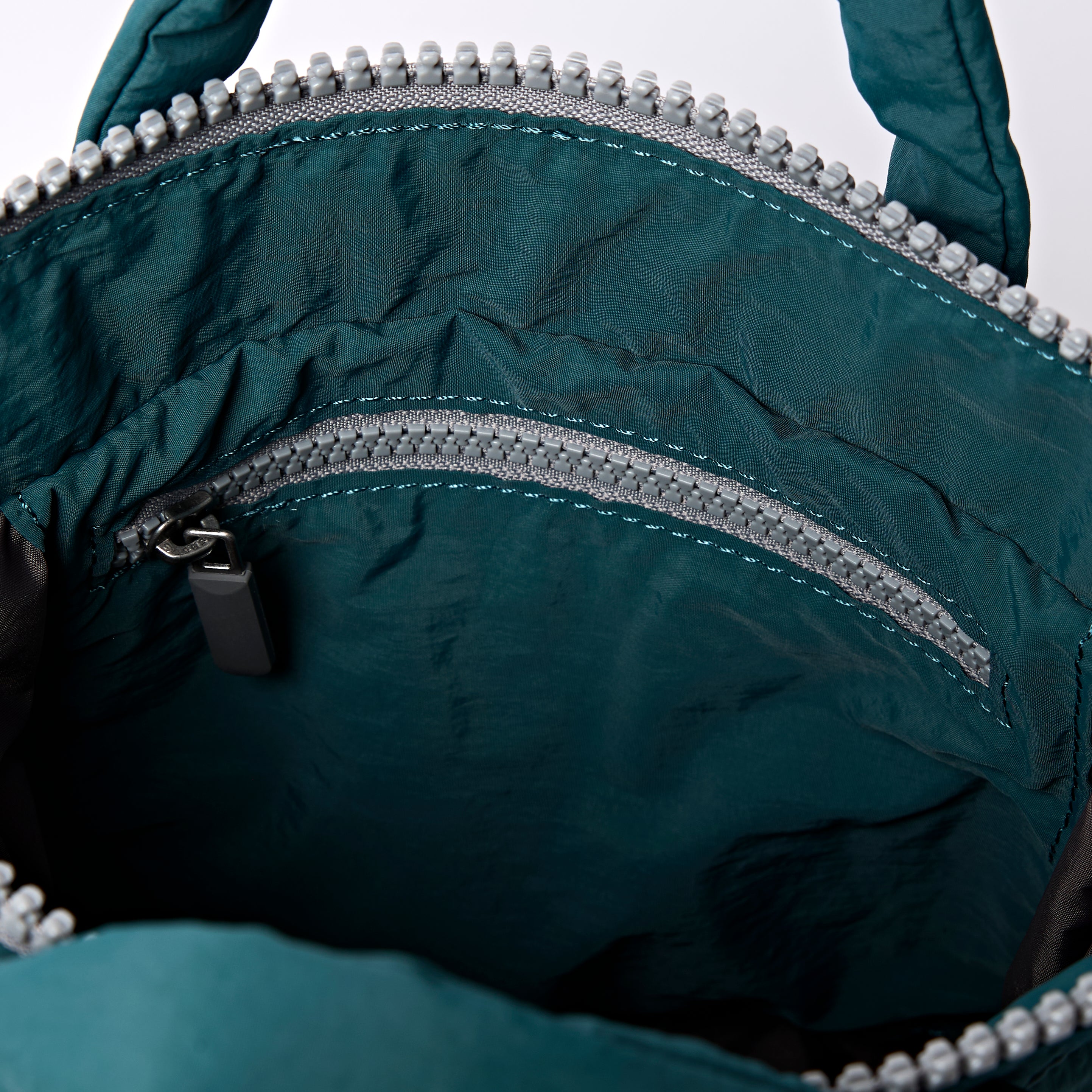 Roka London Bantry XS ryggsekk 5,8 liter teal puffy