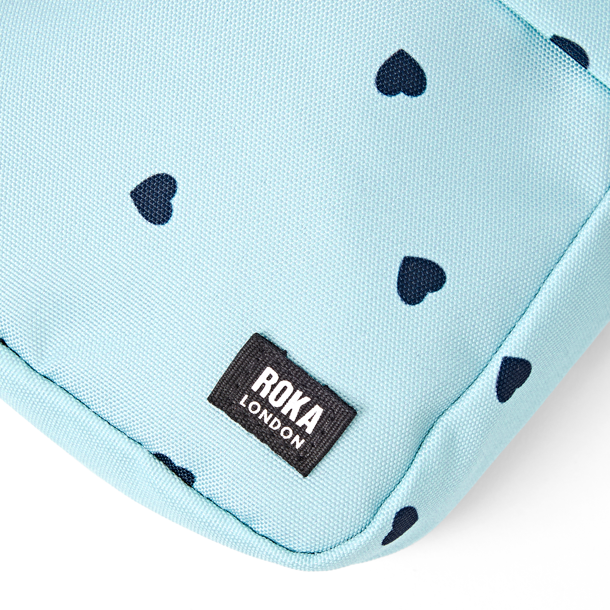 Roka London Bond Pocket skulderveske heart print small 1,5 liter