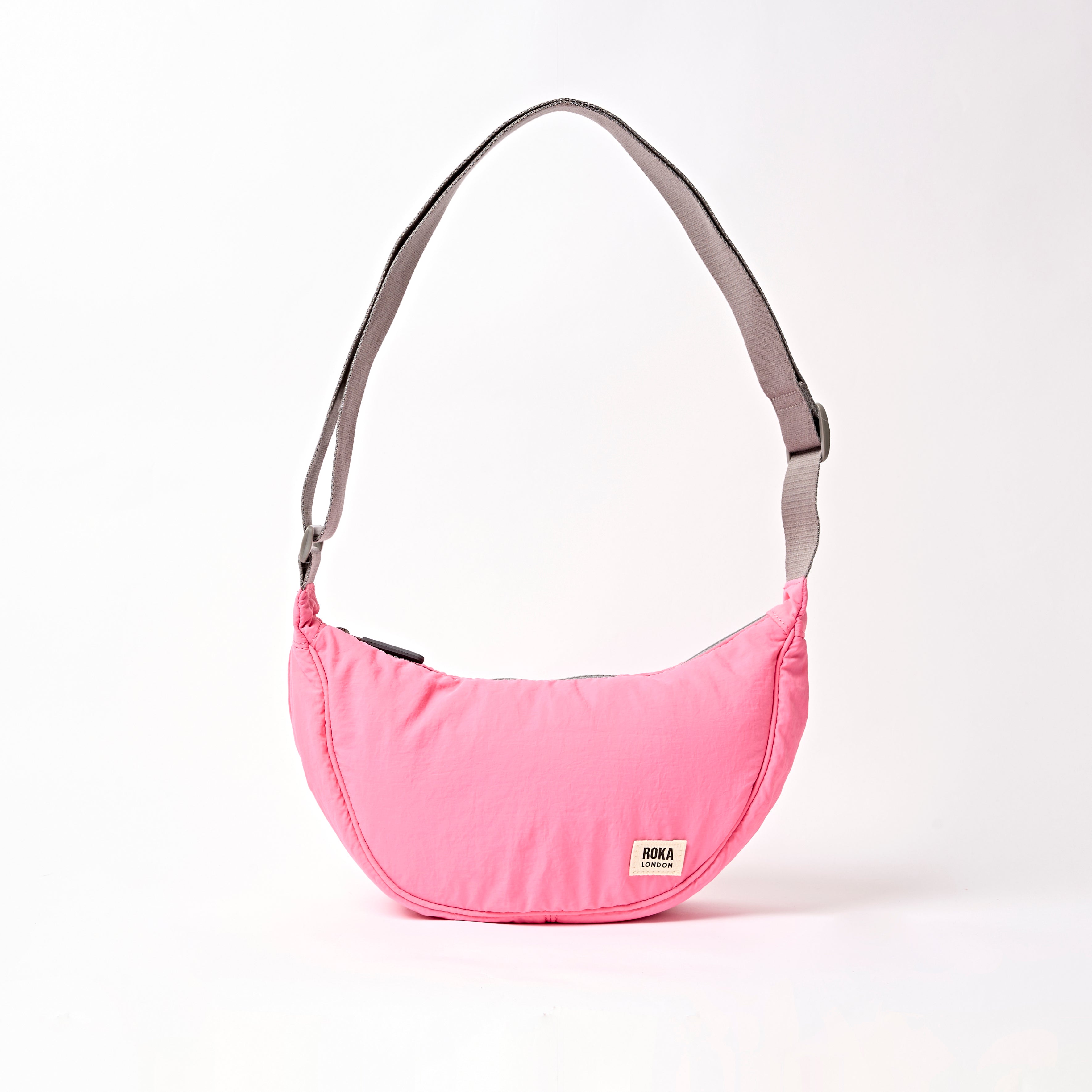 Roka London Farringdon Small halvmåneveske Pink Lemonade