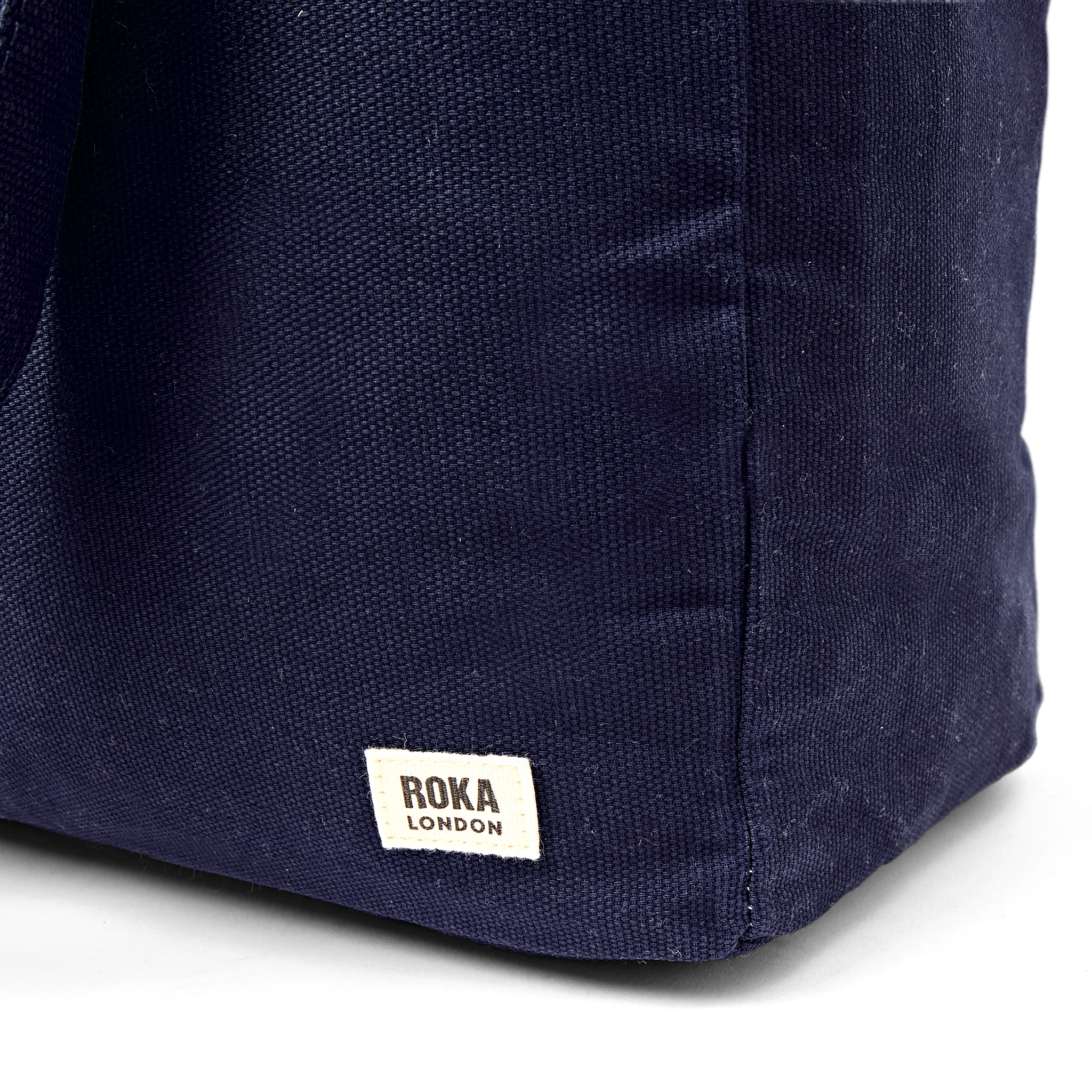 Roka London Sloane tote Medium navy blå canvas 24 liter