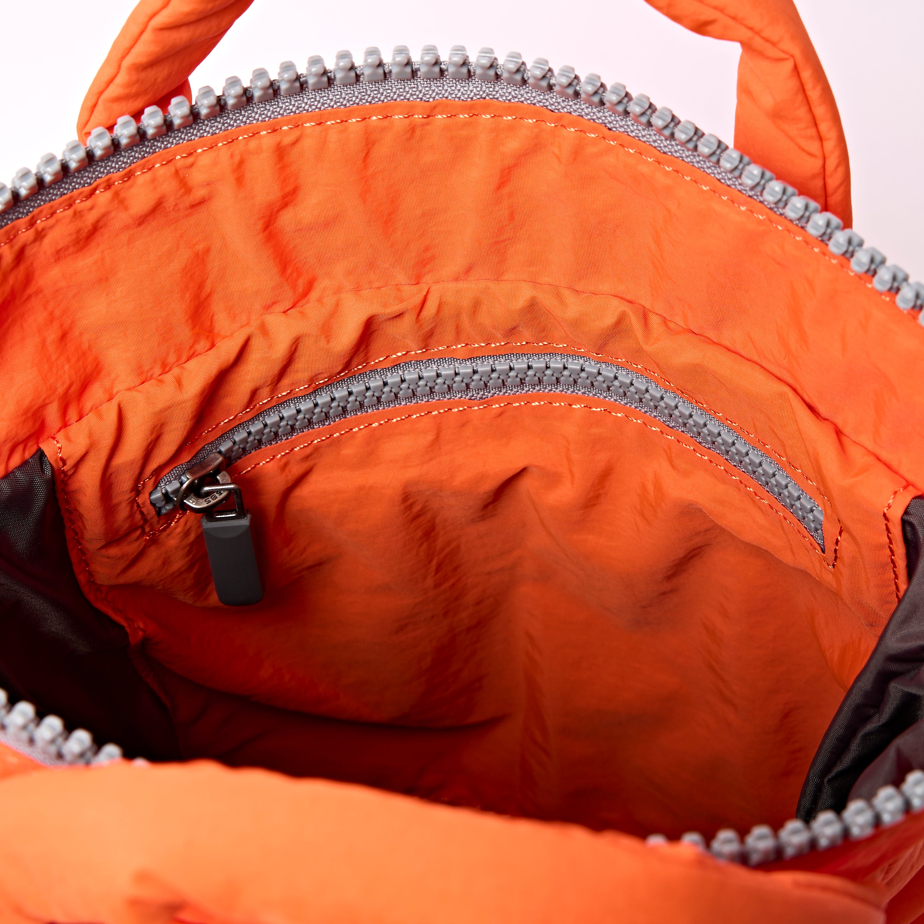 Roka Bantry XS ryggsekk 5,8 liter Retro Tangerine Puffy
