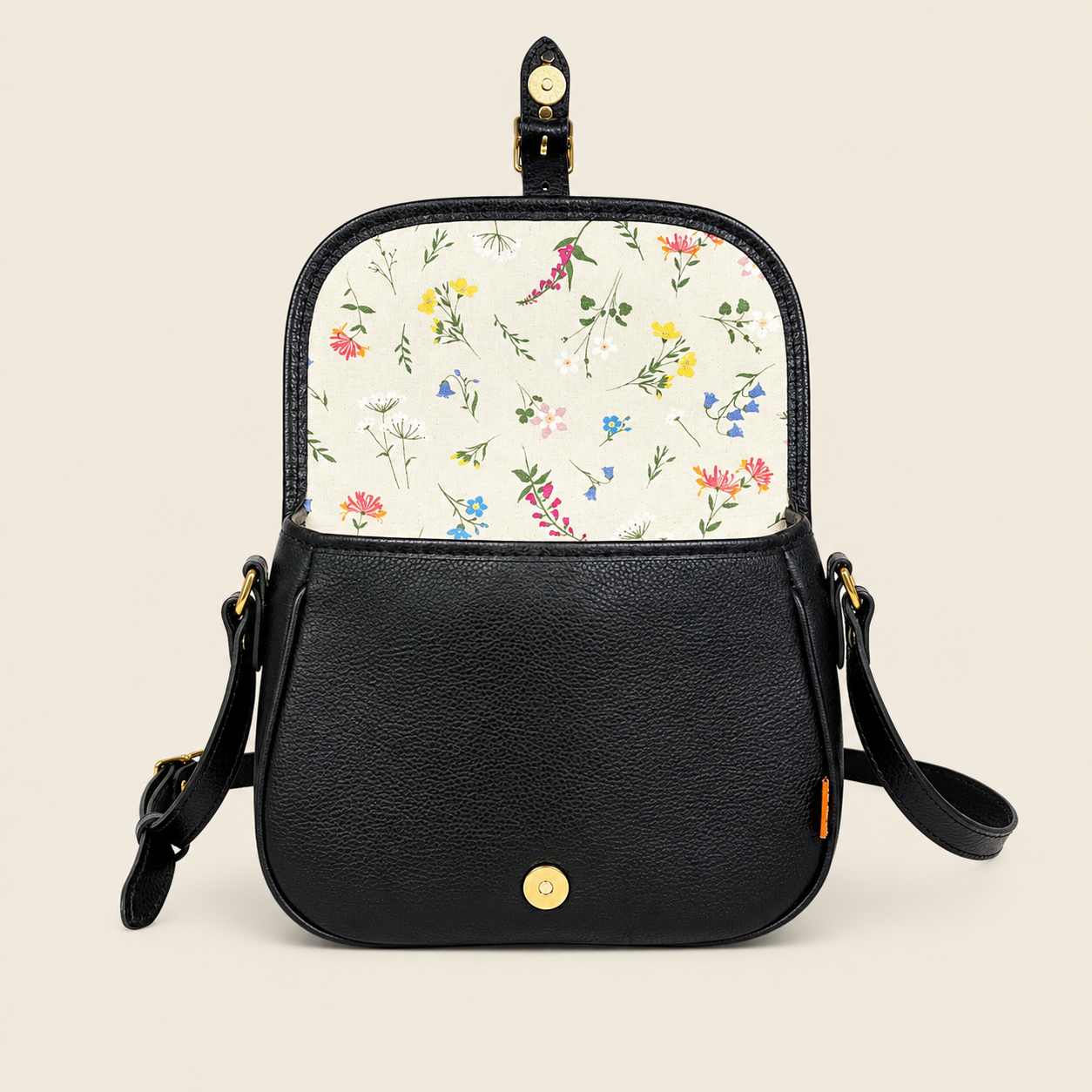 Chapman Saddle skulderveske svart skinn blomsterfôr