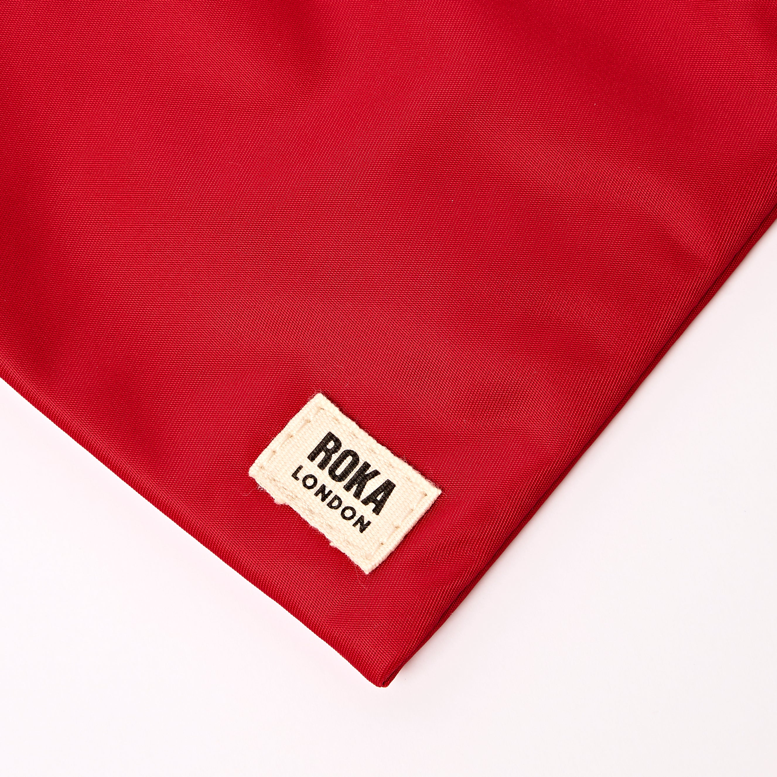 Roka London Chelsea sling cranberry stripe x-small 0,3 l