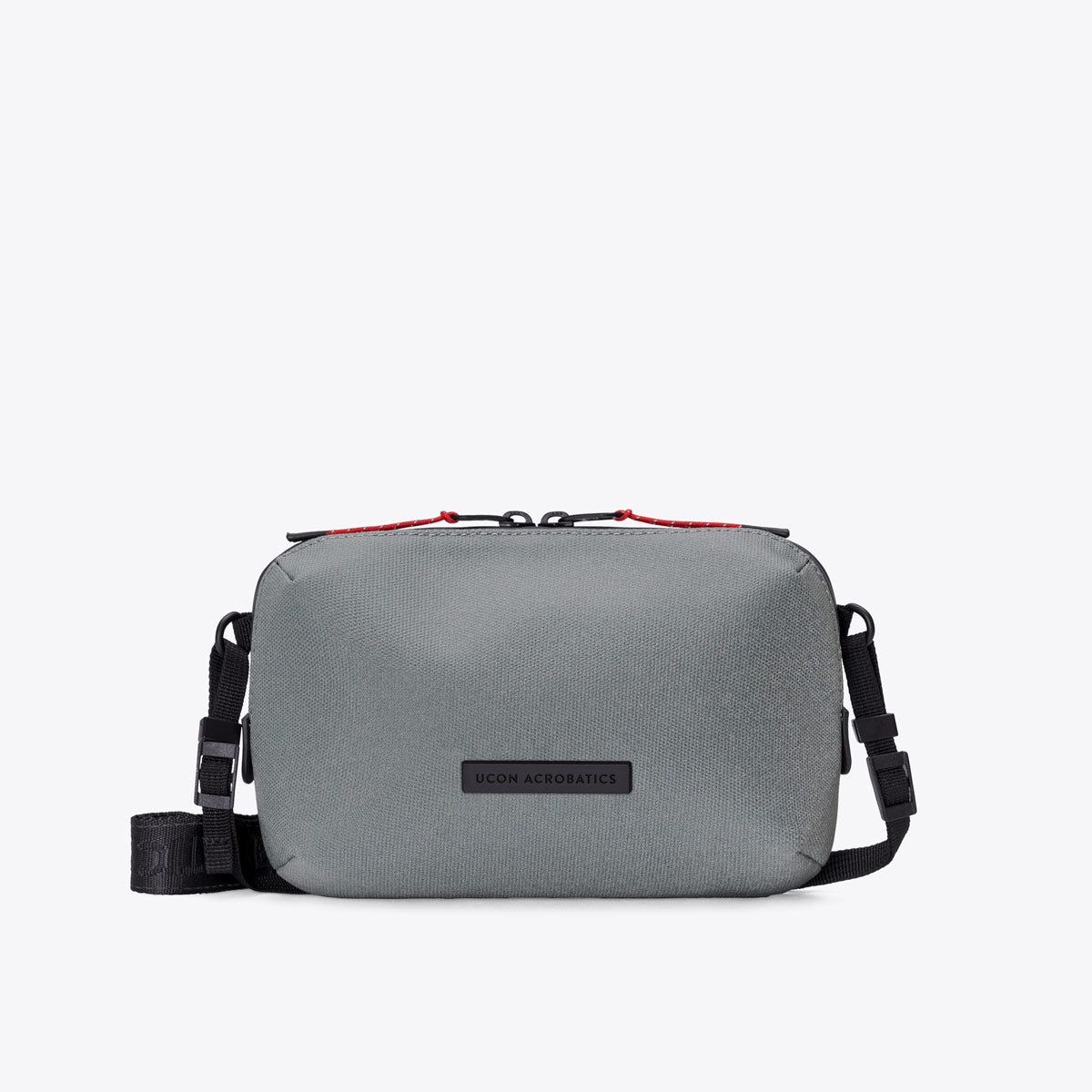 Ucon Acrobatics Ando crossbody-veske Medium Asphalt Reflective lett